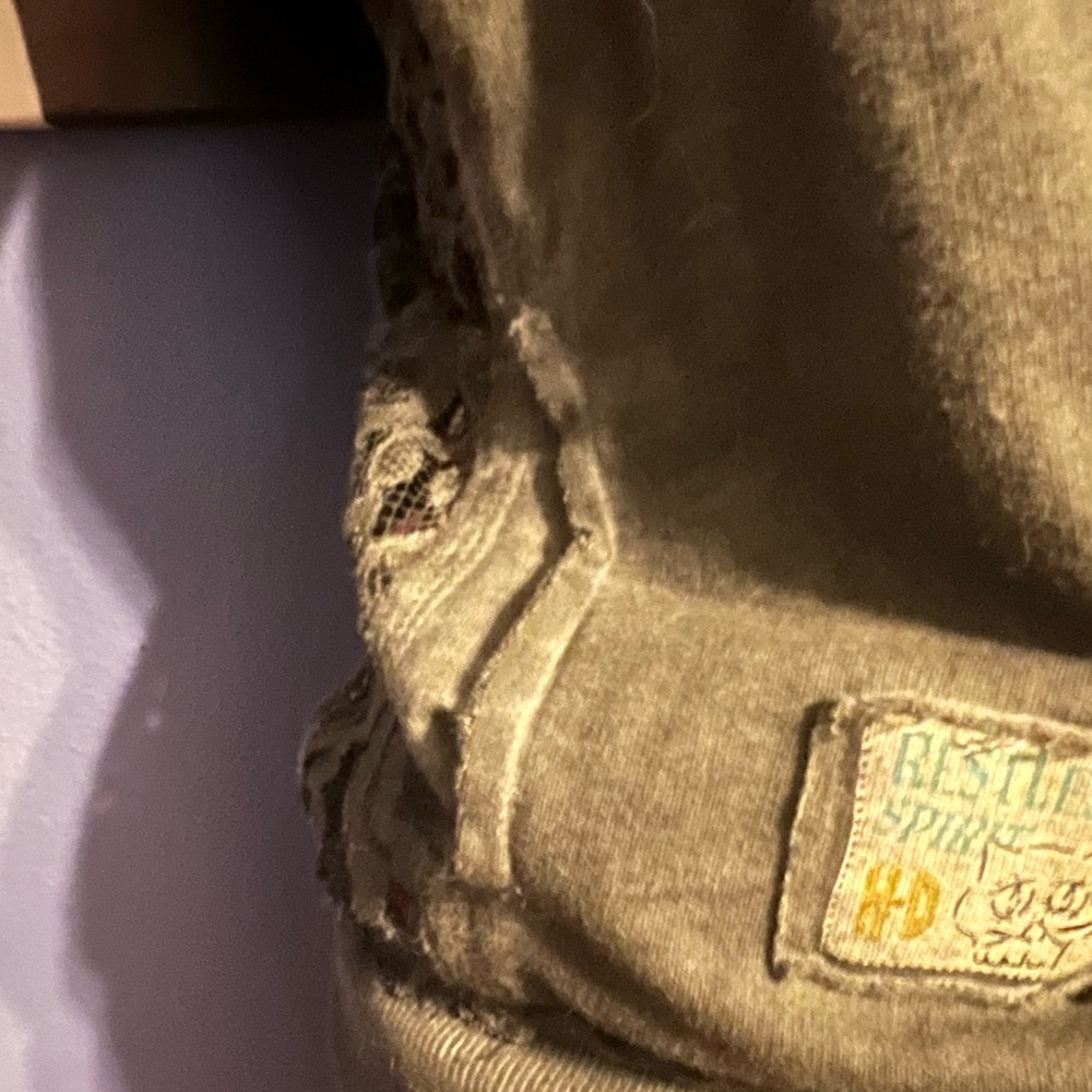 Harley Davidson jacket with lace in the hood on the sleeves down the side